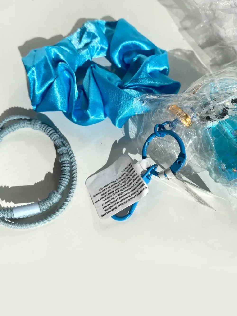 Claire's Gift Panda Tea Water Filled Glitter Keychain Scrunchie Hair Tie